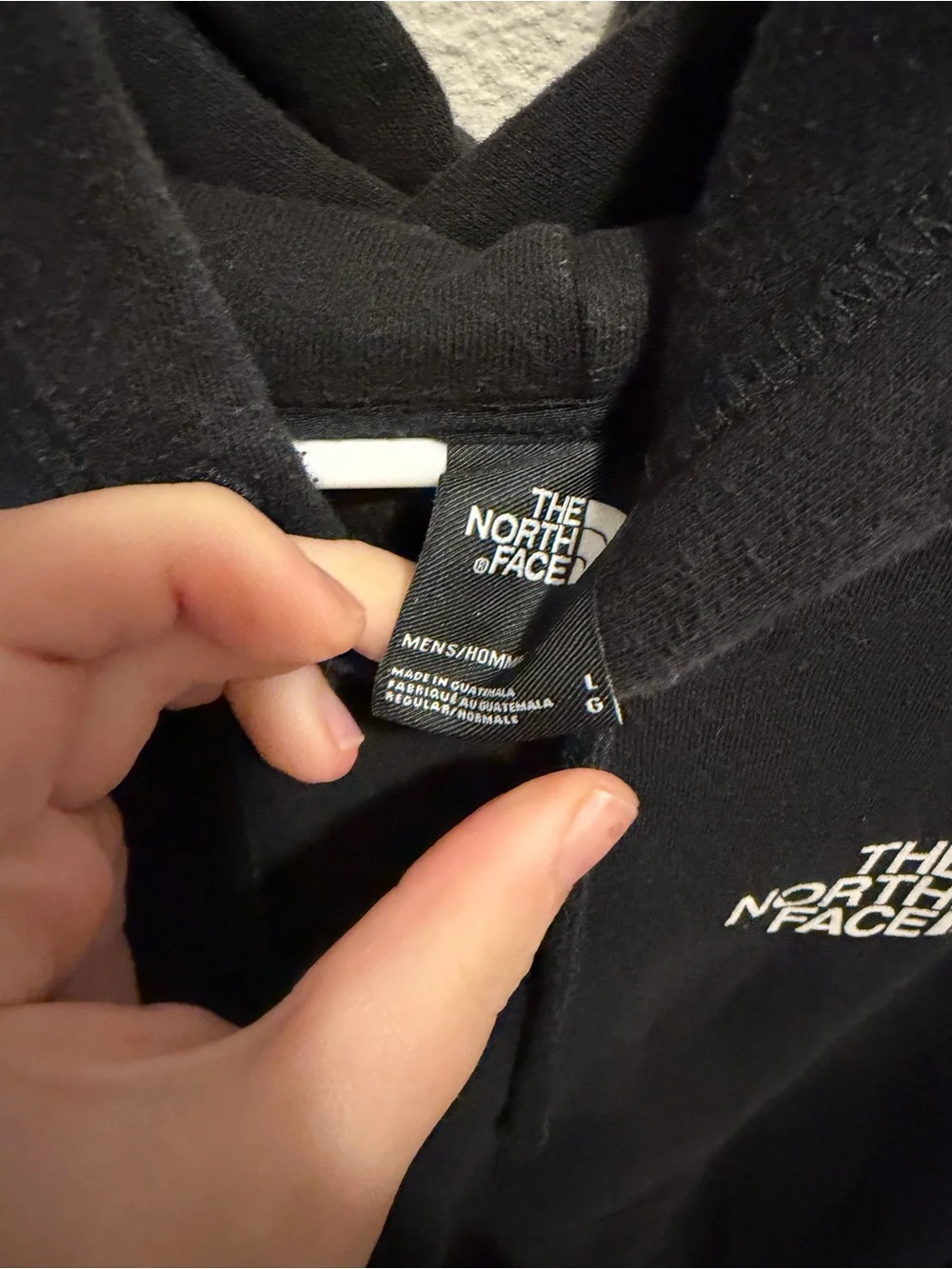 The North Face Black Hoodie with White Logo
